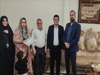 دیدار بخشدار بومهن و رئیس بنیاد شهید شهرستان پردیس با خانواده جانباز حیدری و تجلیل از همسر ایشان به مناسبت روز پرستار